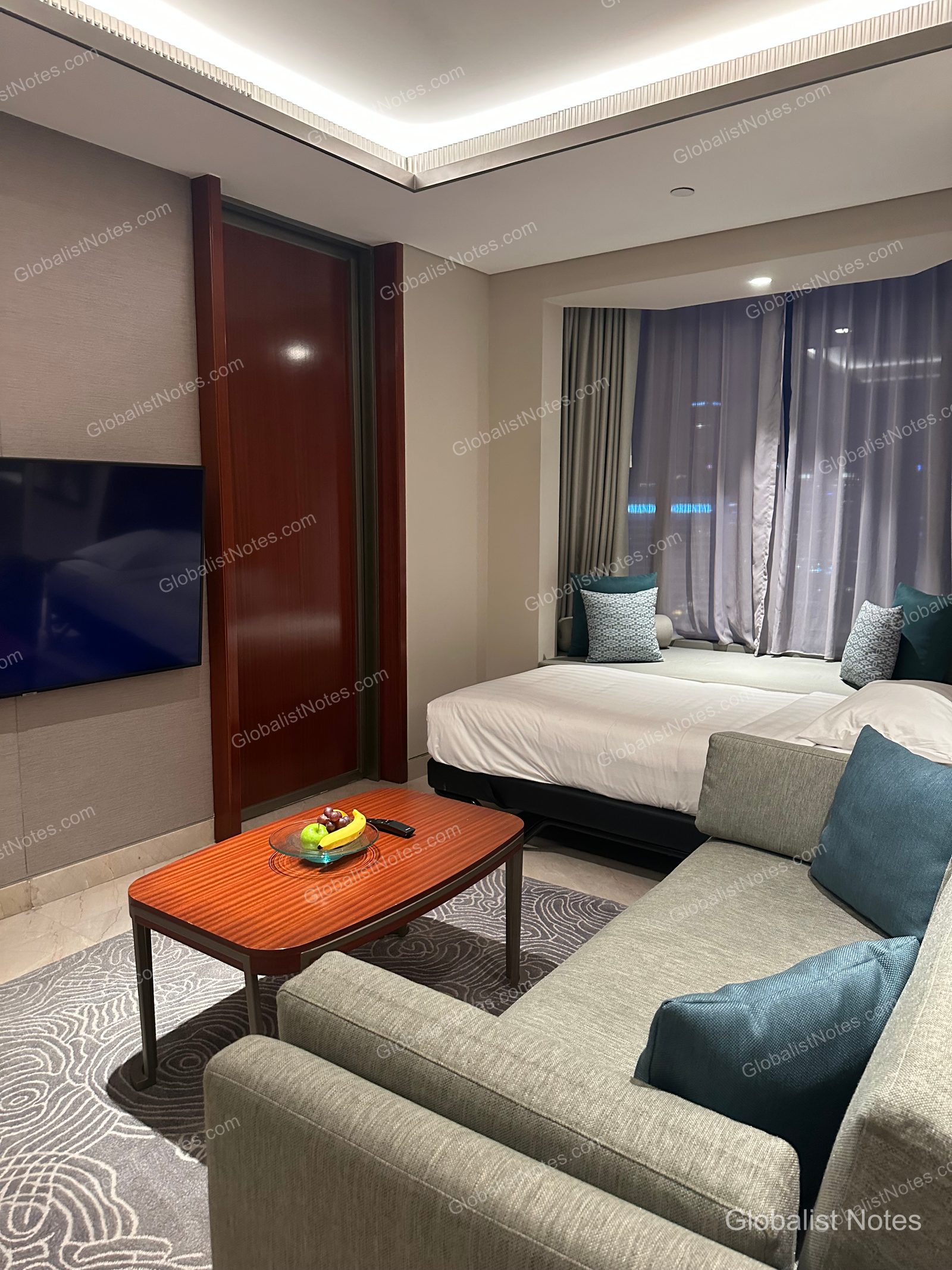 The Grand Suite with Bundaran View received as a Globalist upgrade. The suite was spacious enough to accommodate a rollaway bed while still leaving plenty of room in the separate living and sofa area.