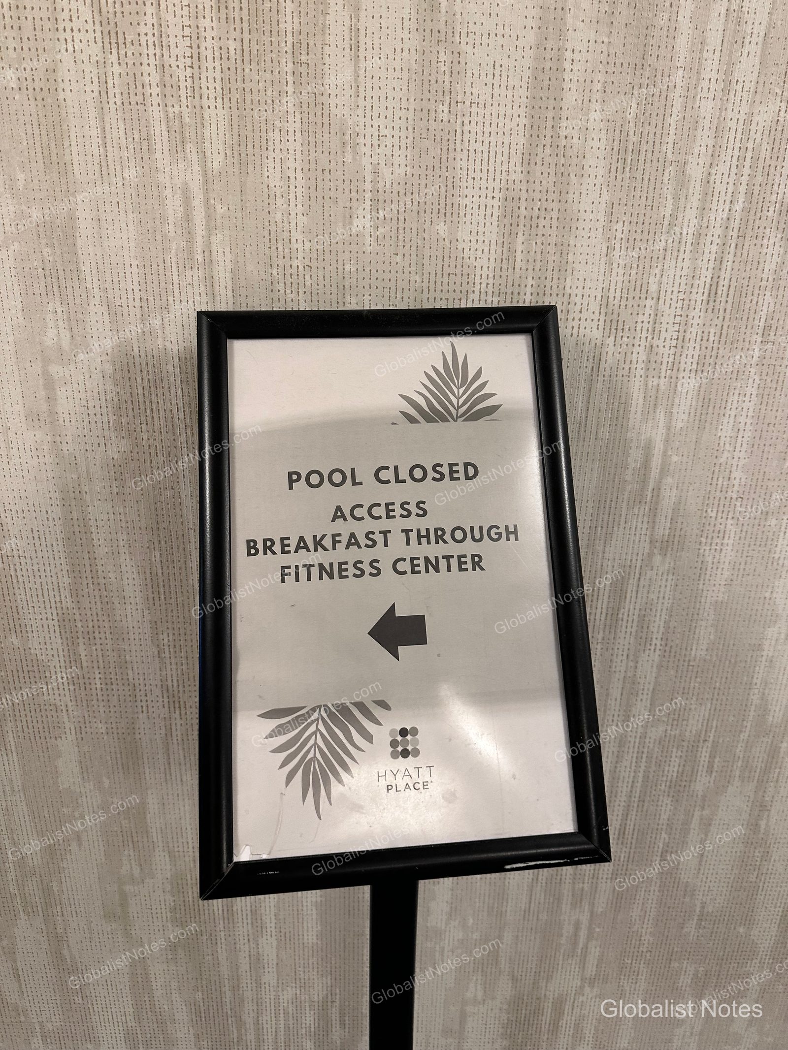 During breakfast hours, the outdoor pool area appeared to be closed for swimming as guests were using the poolside space for dining, accessed through the fitness center.